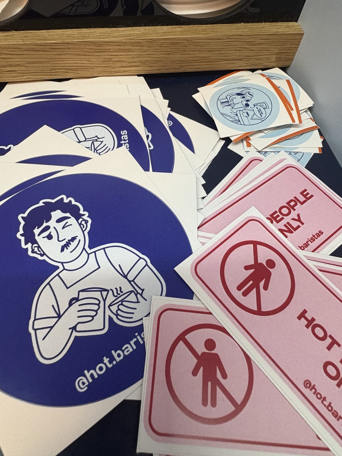 Hot Baristas branded stickers and merchandise